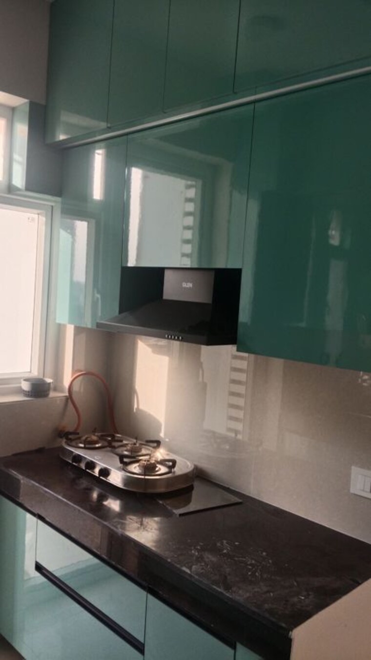 Kitchen, eldeco-live-by-the-greens 2 Bedroom 1155 Sq.Ft. Apartment In Sector 150 Noida 10290746