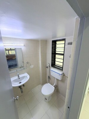 Bathroom in 4 BHK Apartment at Raheja Housing And Commercial Complex – for Sale