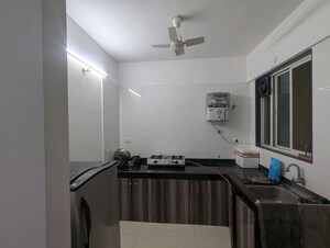 Kitchen in 2 BHK Apartment at Kohinoor Tinsel Town, Hinjewadi – for Rent