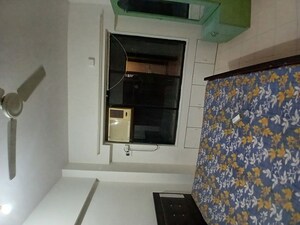 Kitchen in 2 BHK Apartment at Aalind Link Palace CHS, Goregaon East – for Rent