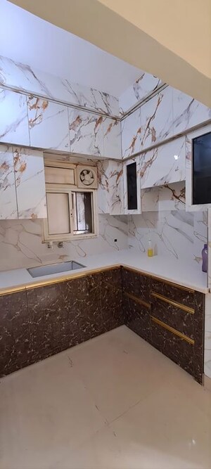 Kitchen in 2 BHK Apartment at Arun Vihar Sector 37, Sector 37 – for Sale