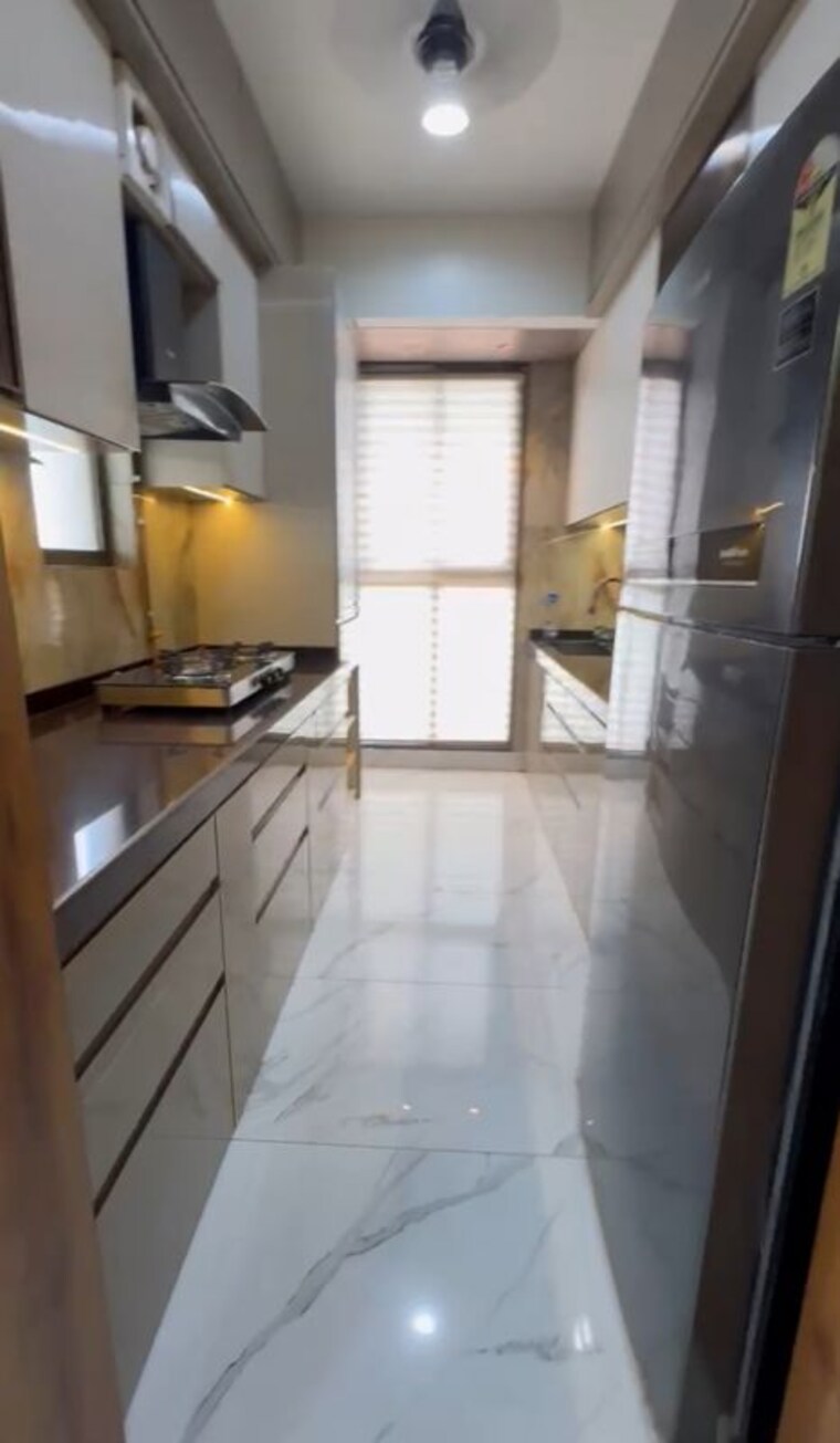 Kitchen, raymond-ten-x-habitat 2 Bedroom 675 Sq.Ft. Apartment In Pokhran Road No Two Thane 10290741