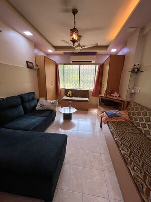 Living Room in 1 BHK Apartment at Springfield Apartment, Malad West – for Rent