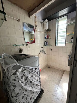 Bathroom in 1 BHK Apartment at Springfield Apartment, Malad West – for Rent