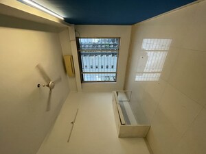 Living Room in 2 BHK Apartment at Riddhi Garden, Malad East – for Rent