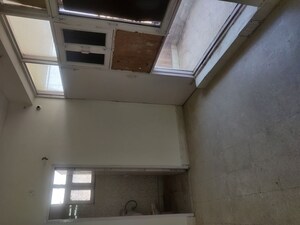 Kitchen in 3 BHK Apartment at Kalibari Apartments, Sector 21d – for Sale