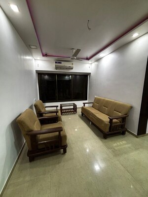 Living Room in 2 BHK Apartment at Riddhi Gardens CHS, Malad East – for Rent
