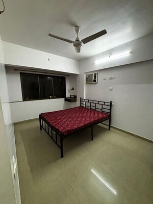 Bedroom in 2 BHK Apartment at Riddhi Gardens CHS, Malad East – for Rent