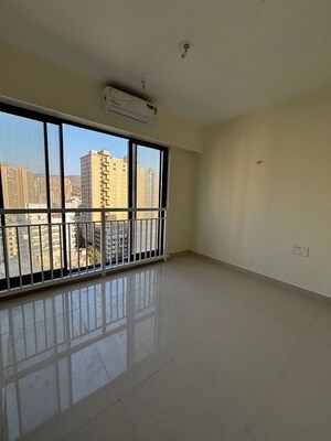 Room in 2 BHK Apartment at Dynamix Divum, Malad East – for Rent