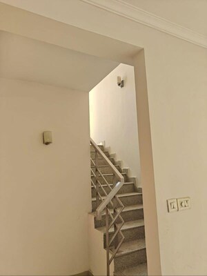 Staircase in 4 BHK Penthouse at Raheja Atharva, Sector 109 – for Rent