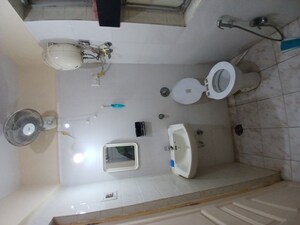 Bathroom in 2 BHK Apartment at Kamanwala Manavsthal II, Goregaon East – for Rent