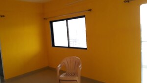 Living Room in 2 BHK Apartment at Royal Cataleya, Ravet – for Sale