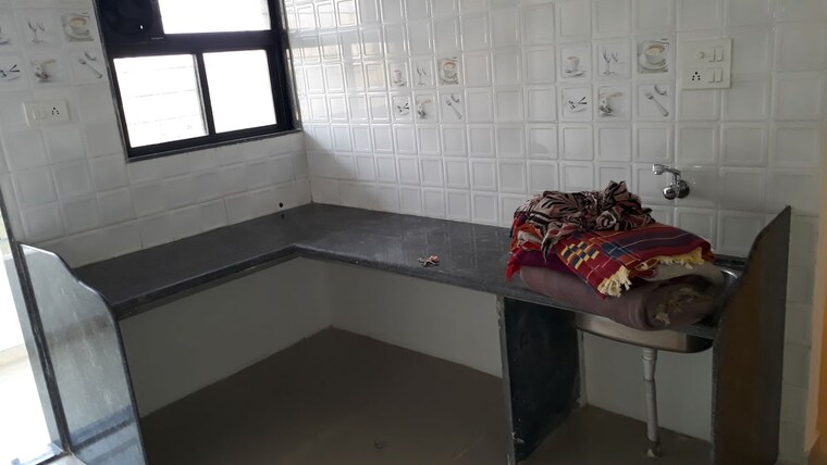 Kitchen, royal-cataleya 2 Bedroom 680 Sq.Ft. Apartment In Ravet Pune 10284083