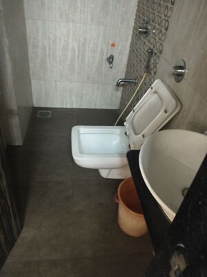 Bathroom in 2 BHK Apartment at Vile Parle East – for Rent
