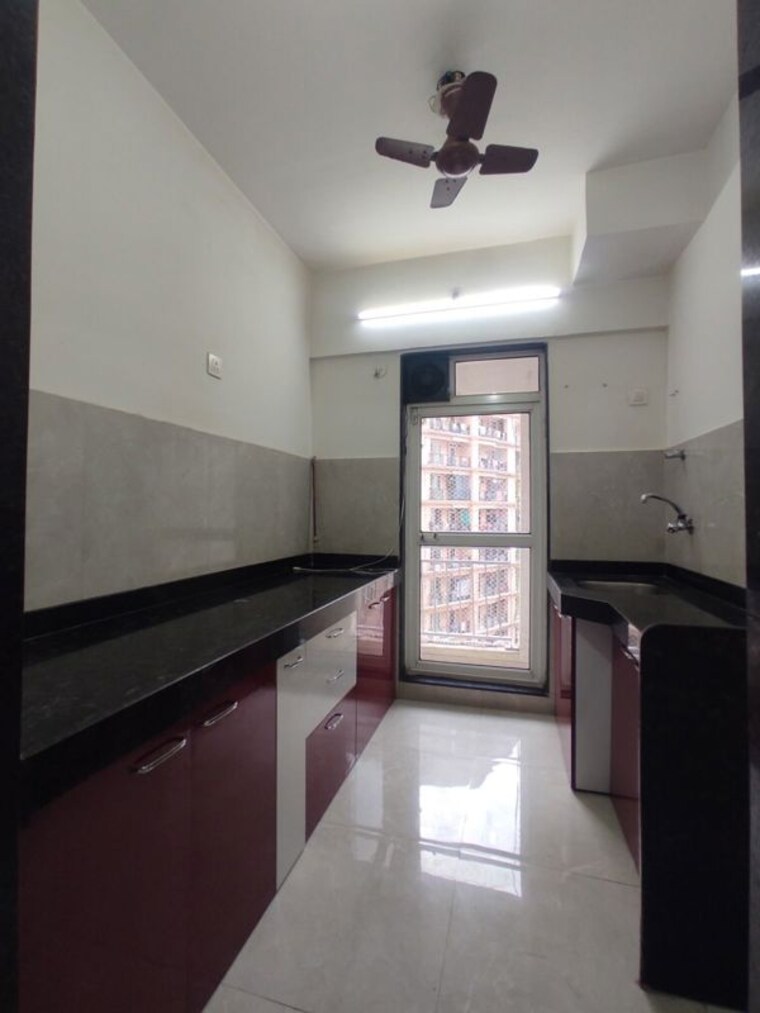 Kitchen, jp-north 2 Bedroom 588 Sq.Ft. Apartment In Mira Road Thane 10291238