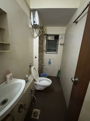 Bathroom in 2 BHK Apartment at Mantri Park, Goregaon East – for Rent