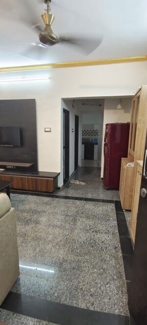 Living Room in 1 BHK Apartment at Vrindavan CHS, Mahim – for Sale