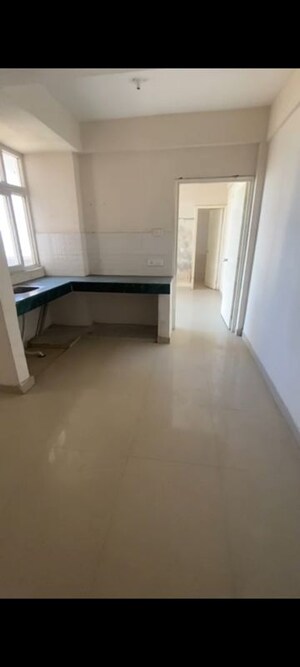 Kitchen in 1 BHK Apartment at Shree Vardhman Green Court, Sector 90 – for Sale