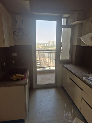 Kitchen in 3 BHK Apartment at Godrej Meridien, Sector 106 – for Rent