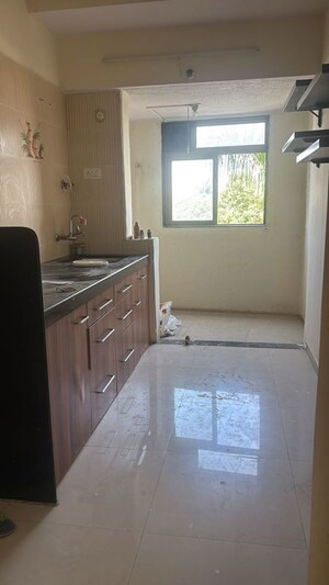 Kitchen in 2 BHK Apartment at Sufalam Apartment Chembur, Chembur – for Rent