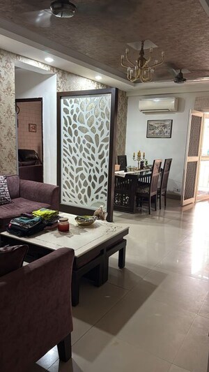 Living Room in 3 BHK Apartment at Aims Golf City, Sector 75 – for Rent