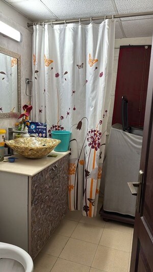 Bathroom in 3 BHK Apartment at Aims Golf City, Sector 75 – for Rent