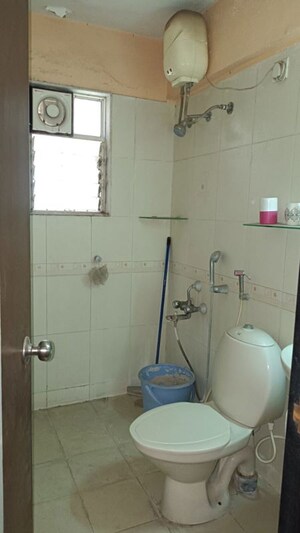 Bathroom in 2 BHK Apartment at Runwal Seagull, Hadapsar – for Rent