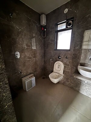 Bathroom in 3 BHK Apartment at Poonam Vaishno Heights, Malad East – for Rent