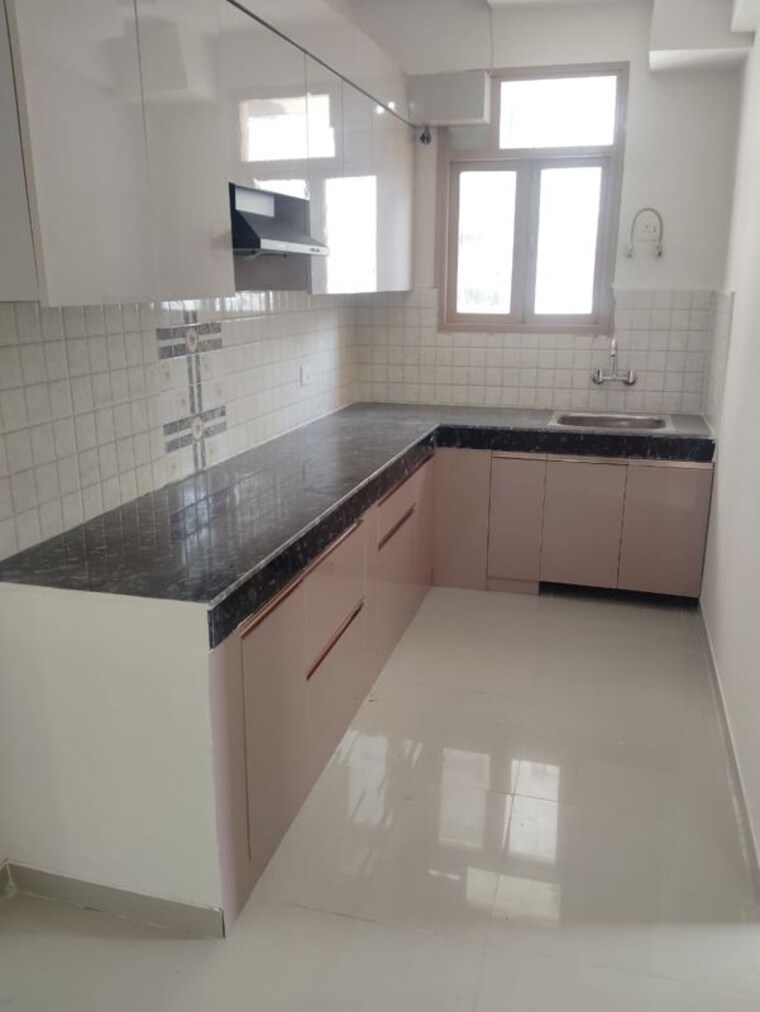 Kitchen, pareena-om-apartments 2 Bedroom 680 Sq.Ft. Apartment In Sector 112 Gurgaon 10291847