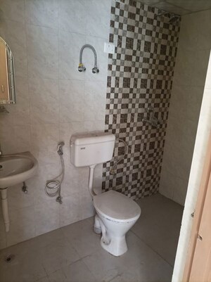 Bathroom in 2 BHK Apartment at Pareena Om Apartments, Sector 112 – for Rent