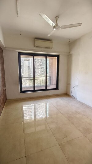 Room in 2 BHK Apartment at Satellite Royale, Goregaon East – for Rent