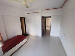 Bedroom in 2 BHK Apartment at Aditya Thana CHS Sopan, Panch Pakhadi – for Rent