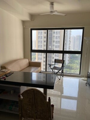 Living Room in 1 BHK Apartment at Lodha Crown Quality Homes, Majiwada – for Sale