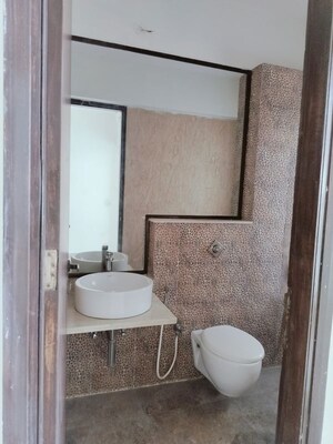 Bathroom in 3 BHK Apartment at Omkar Alta Monte, Malad East – for Rent