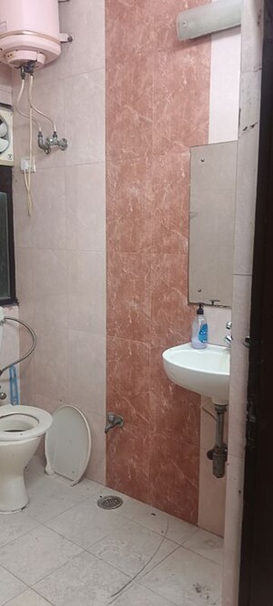 Bathroom in 3 BHK Apartment at Chittaranjan Park – for Rent