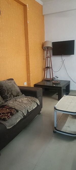 Living Room in 2 BHK Apartment at Antriksh Golf View - II, Sector 78 – for Rent
