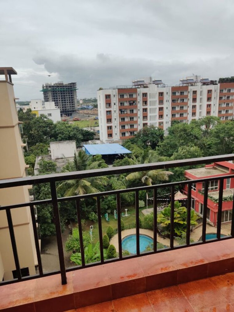 Balcony, madhuban-satin-brick 2 Bedroom 1200 Sq.Ft. Apartment In Kharadi Pune 10292440