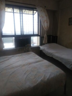 Living Room in 2 BHK Apartment at Sunshree Woods, Nibm Road – for Rent