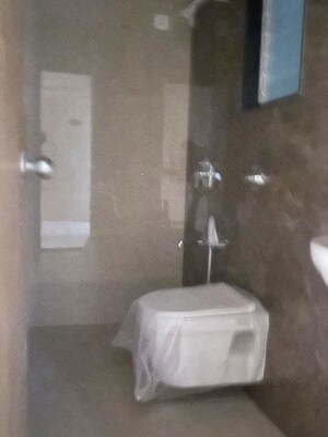 Bathroom in 1 BHK Apartment at Haware Intelligentia Axis, Borivali East – for Rent