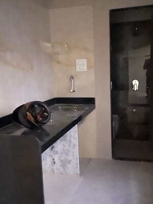 Kitchen in 1 BHK Apartment at Haware Intelligentia Axis, Borivali East – for Rent