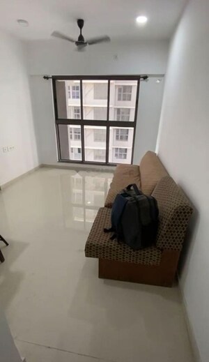 Living Room in 1 BHK Apartment at UK Iridium, Kandivali East – for Rent