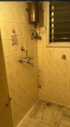 Bathroom in 1 RK Apartment at Navratna CHS Mahim, Mahim – for Rent