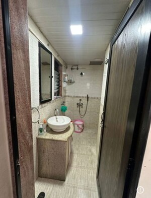Bathroom in 1 BHK Apartment at Accord CHS Andheri West, Andheri West – for Rent