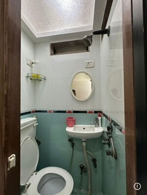 Bathroom in 1 BHK Apartment at Accord CHS Andheri West, Andheri West – for Rent