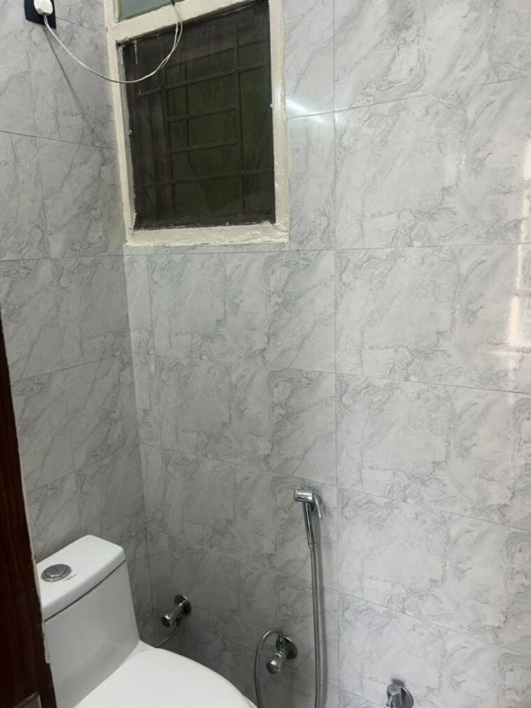 Bathroom, tulip-yellow 3 Bedroom 1704 Sq.Ft. Apartment In Sector 69 Gurgaon 10292922