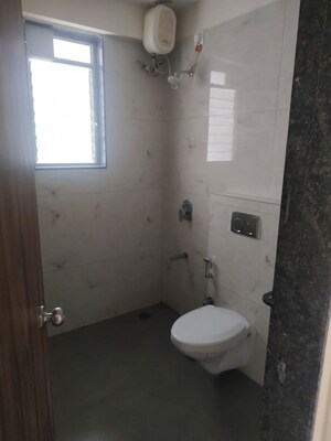 Bathroom in 2 BHK Apartment at Tattva Mittal Cove, Andheri West – for Rent