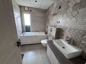 Bathroom in 4 BHK Apartment at Parx Laureate, Sector 108 – for Rent