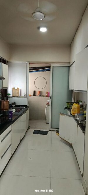 Kitchen in 2 BHK Apartment at Amanora Gold Towers, Hadapsar – for Sale