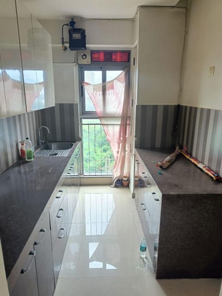 Kitchen, lodha-amara 3 Bedroom 2200 Sq.Ft. Apartment In Kolshet Road Thane 10293695