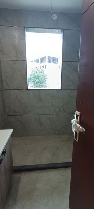 Bathroom in 4 BHK Builder Floor at Puri Aman Vilas, Sector 89 – for Sale